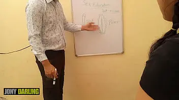 A Indian tuition teacher explains pussy and dick to her student in a clear Hindi manner