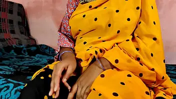 A Desi Indian woman masturbates herself using her fingers until orgasm