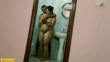 A Desi woman engages in explicit sex with a young hotel employee